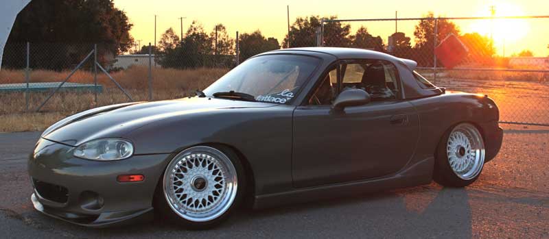 This NB Mazda Miata is slammed on a custom set of BBS RS wheels. 