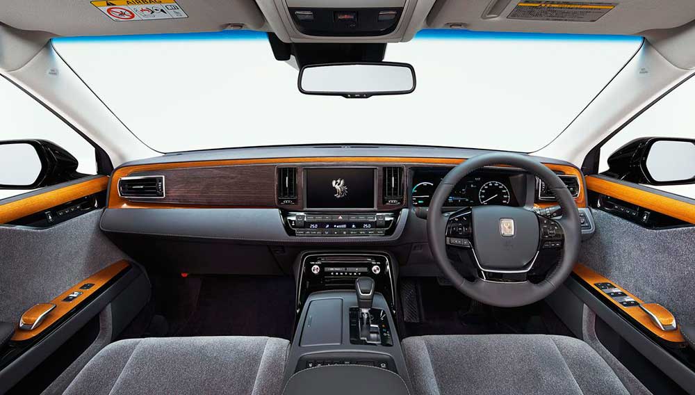 Cockpit and dashboard of the Toyota Century. Use of different shades of wood are a modern and classy design touch. LCD screen and climate controls look proper, not complicated and overpowering as in other offerings. - 2018 Toyota Century HYBRID The Ultimate in JDM Luxury